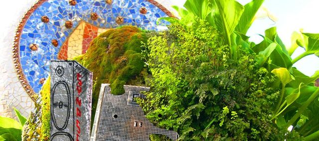 a collage of images from barcelona, looking like an island with graffiti speakers